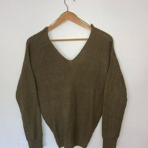 Adorable woman top! Cute back cuts up a little! New with tags